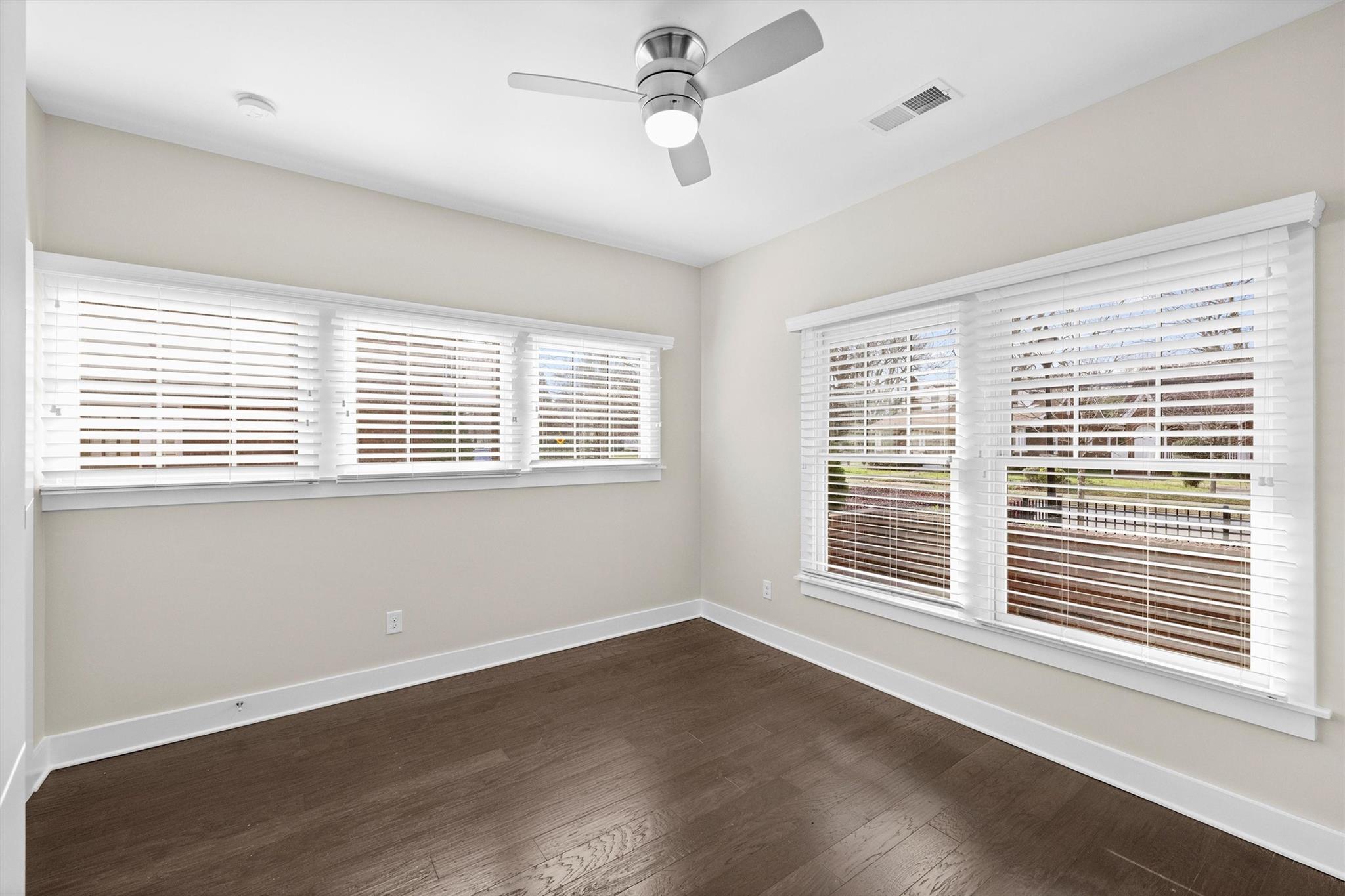 131 Grandin Road Charlotte, NC 28208 - Photo 40 of 45 a view of an empty room with wooden floor and a window