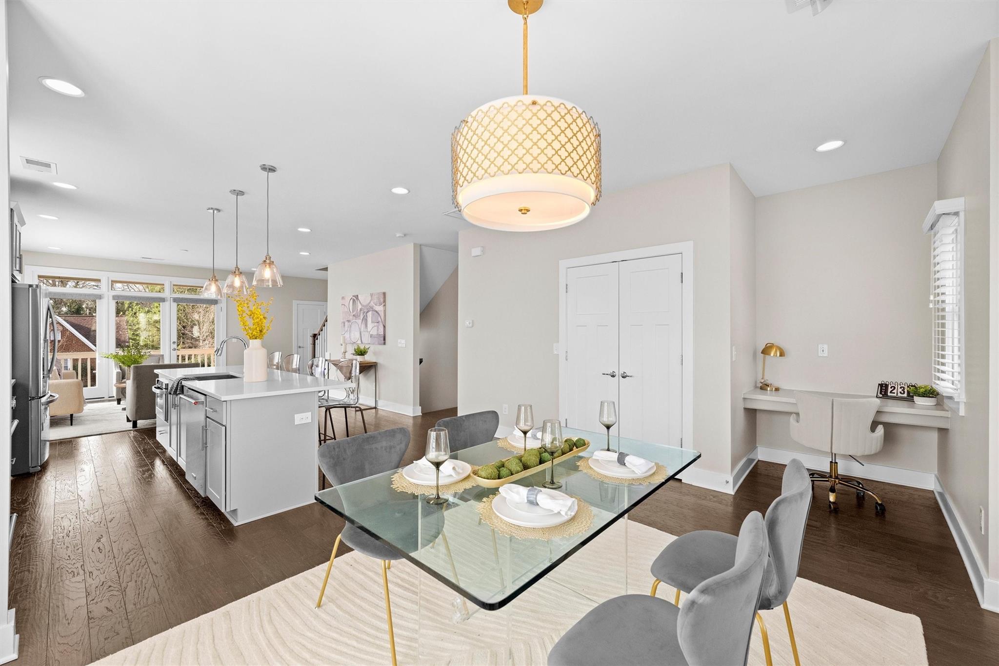 131 Grandin Road Charlotte, NC 28208 - Photo 8 of 45 a dining room with furniture a kitchen view and wooden floor