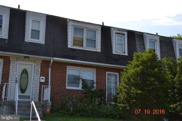 5703 Whitby Road Baltimore, MD 21206 - Photo 1 of 16 a front view of a house with garden