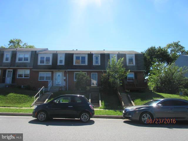 5703 Whitby Road Baltimore, MD 21206 - Photo 2 of 16 a car parked in front of a house