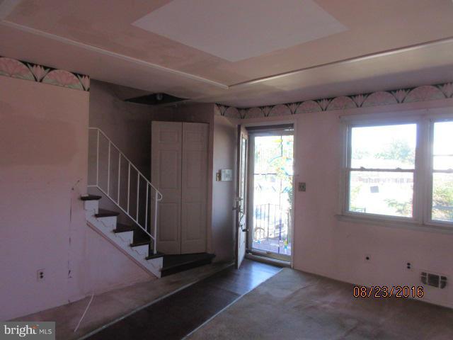 5703 Whitby Road Baltimore, MD 21206 - Photo 5 of 16 a view of an empty room with a window