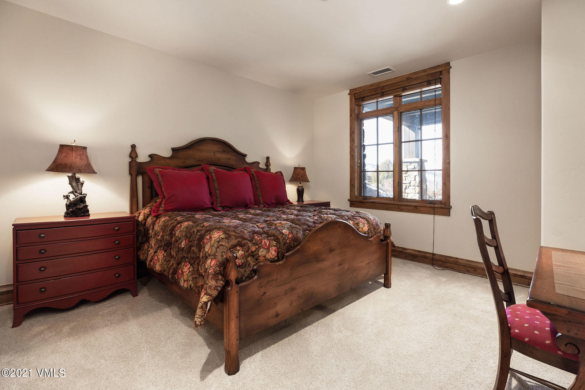 5 Casteel Ridge Edwards, CO 81632 - Photo 16 of 31 a bed sitting in a bedroom next to a window