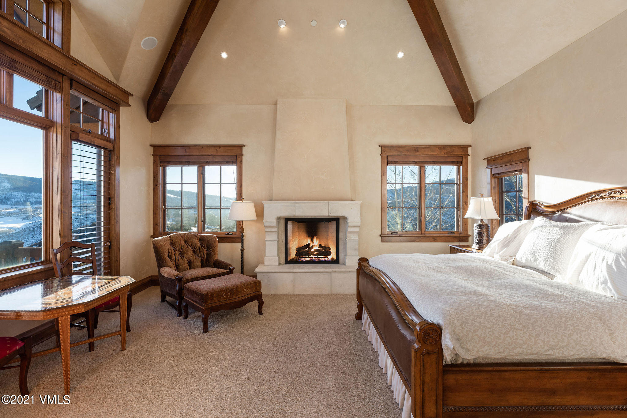 5 Casteel Ridge Edwards, CO 81632 - Photo 7 of 31 a bedroom with furniture and a fireplace