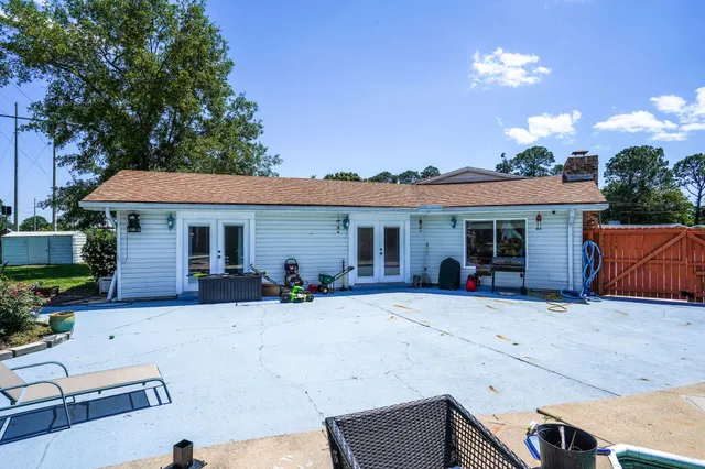 a front view of a house with a patio