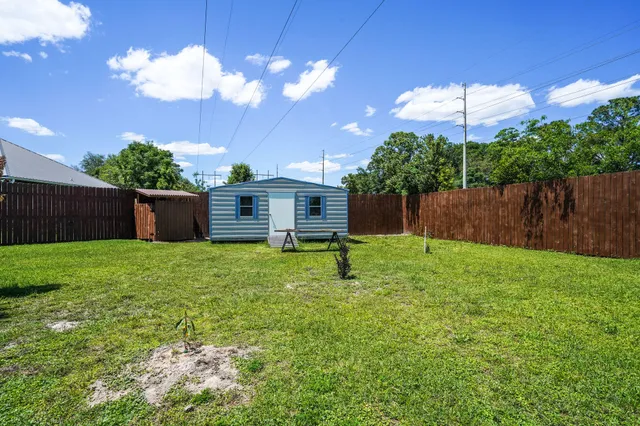 a view of a backyard with a garden