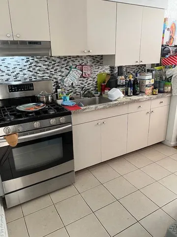 a bathroom with a toilet and a sink