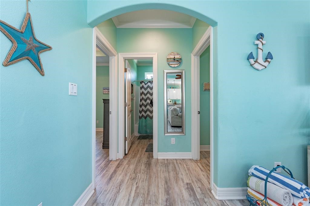987 Surf Crystal Beach Crystal Beach, TX 77650 - Photo 17 of 45 wooden floor in a gallery