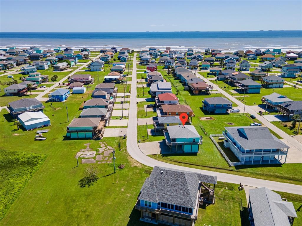 987 Surf Crystal Beach Crystal Beach, TX 77650 - Photo 2 of 45 a view of an outdoor space