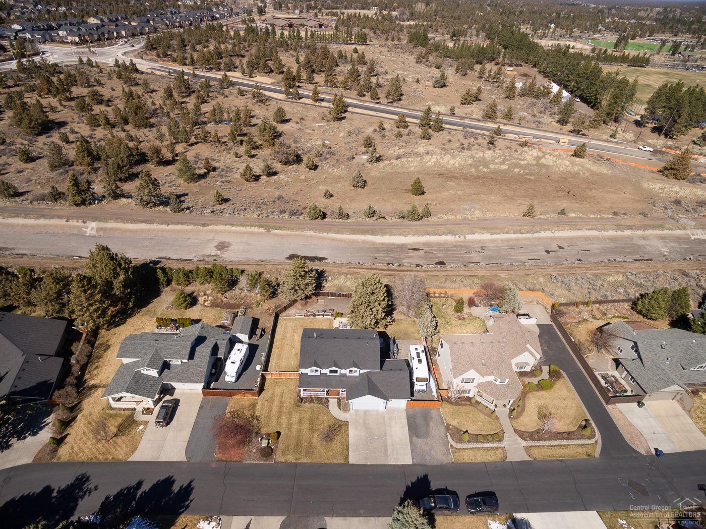 3341 Northeast Stonebrook Loop Bend, OR 97701 - Photo 25 of 25 an aerial view of residential building and parking space