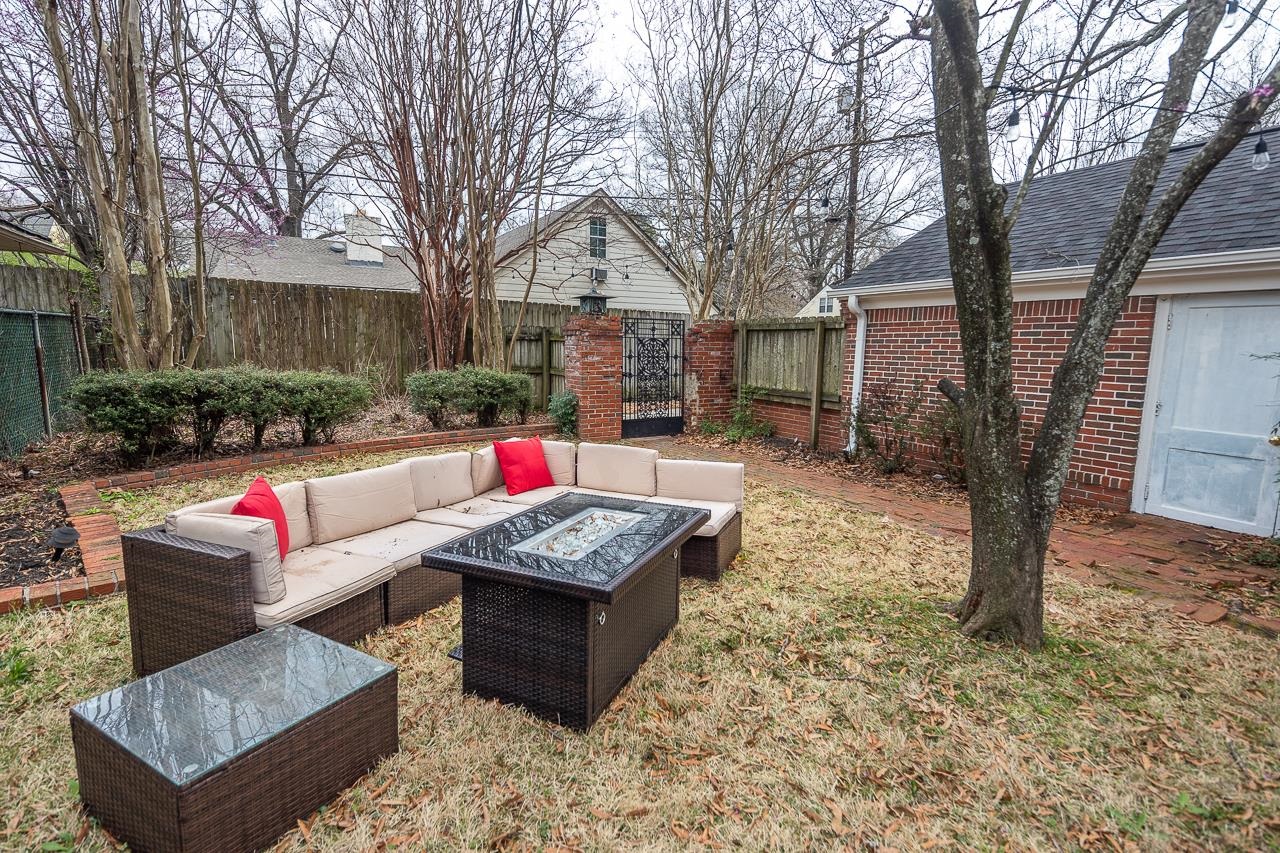 8 South Ashlawn Road Memphis, TN 38112 - Photo 19 of 23 a view of a backyard with sitting area covered with snow