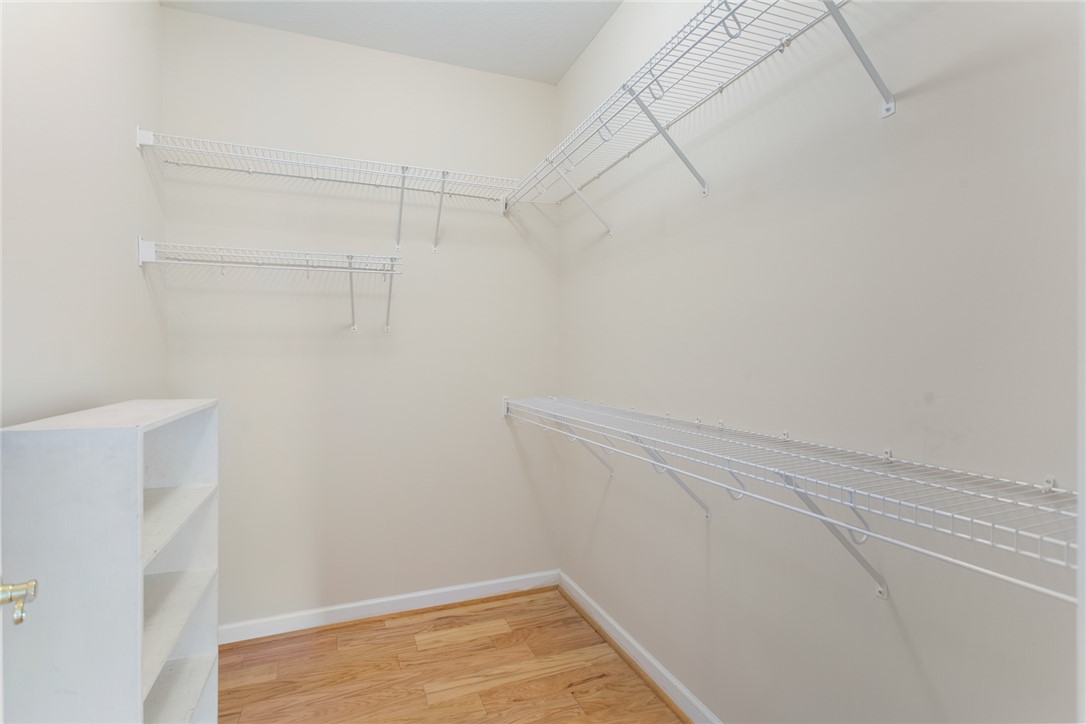 155 Life Style Lane Anderson, SC 29621 - Photo 22 of 49 This spacious walk-in closet offers ample storage with built-in wire shelving and durable hardwood flooring.