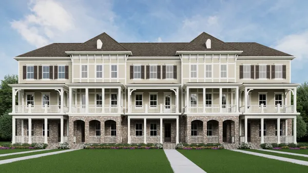 front view of a building with a yard