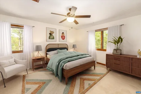 a view of empty room with ceiling fan