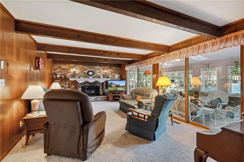 229 Crawford Lane Rostraver Township, PA 15012 - Photo 15 of 48 a living room with furniture and a large window