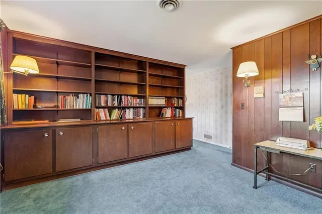 a room with a bookshelf