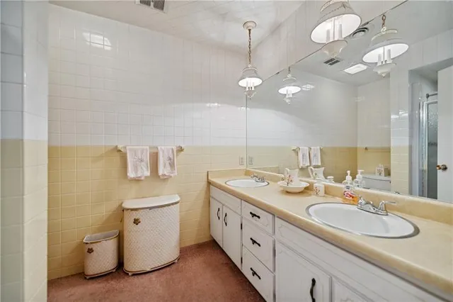 a bedroom with furniture and window