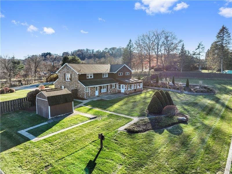 229 Crawford Lane Rostraver Township, PA 15012 - Photo 45 of 48 a swimming pool with outdoor seating and yard