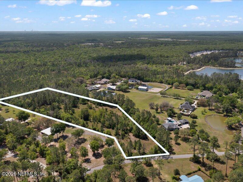 5371 Church Road St. Augustine, FL 32092 - Photo 4 of 33 a view of a balcony with an outdoor space and seating area