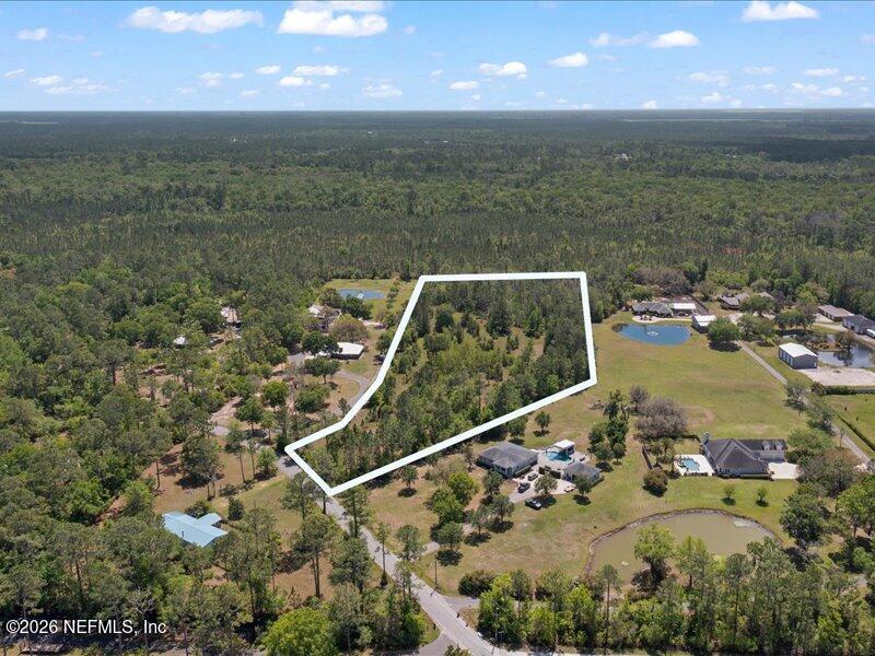 5371 Church Road St. Augustine, FL 32092 - Photo 8 of 33 a view of a balcony with chairs