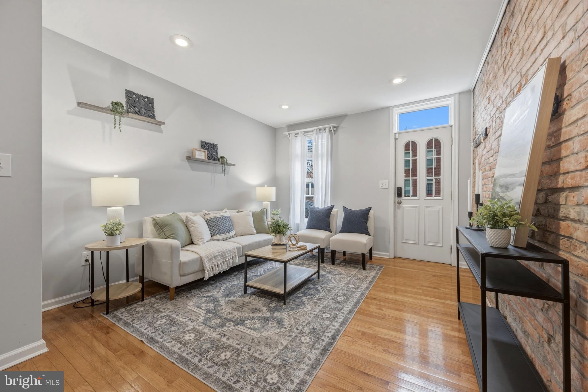 1419 Andre Street Baltimore, MD 21230 - Photo 1 of 25 a living room with furniture and wooden floor