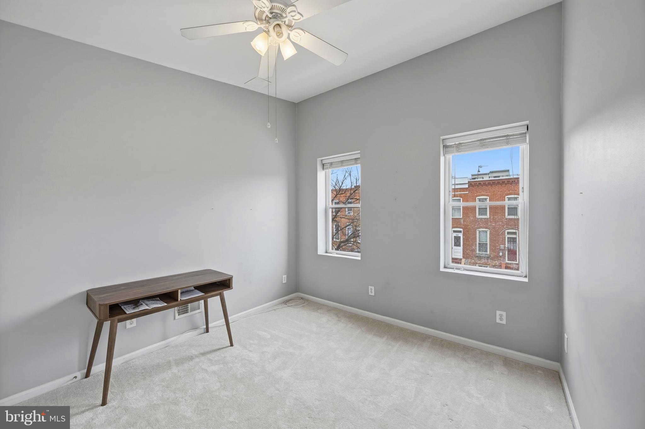 1419 Andre Street Baltimore, MD 21230 - Photo 16 of 25 a view of an empty room with a window