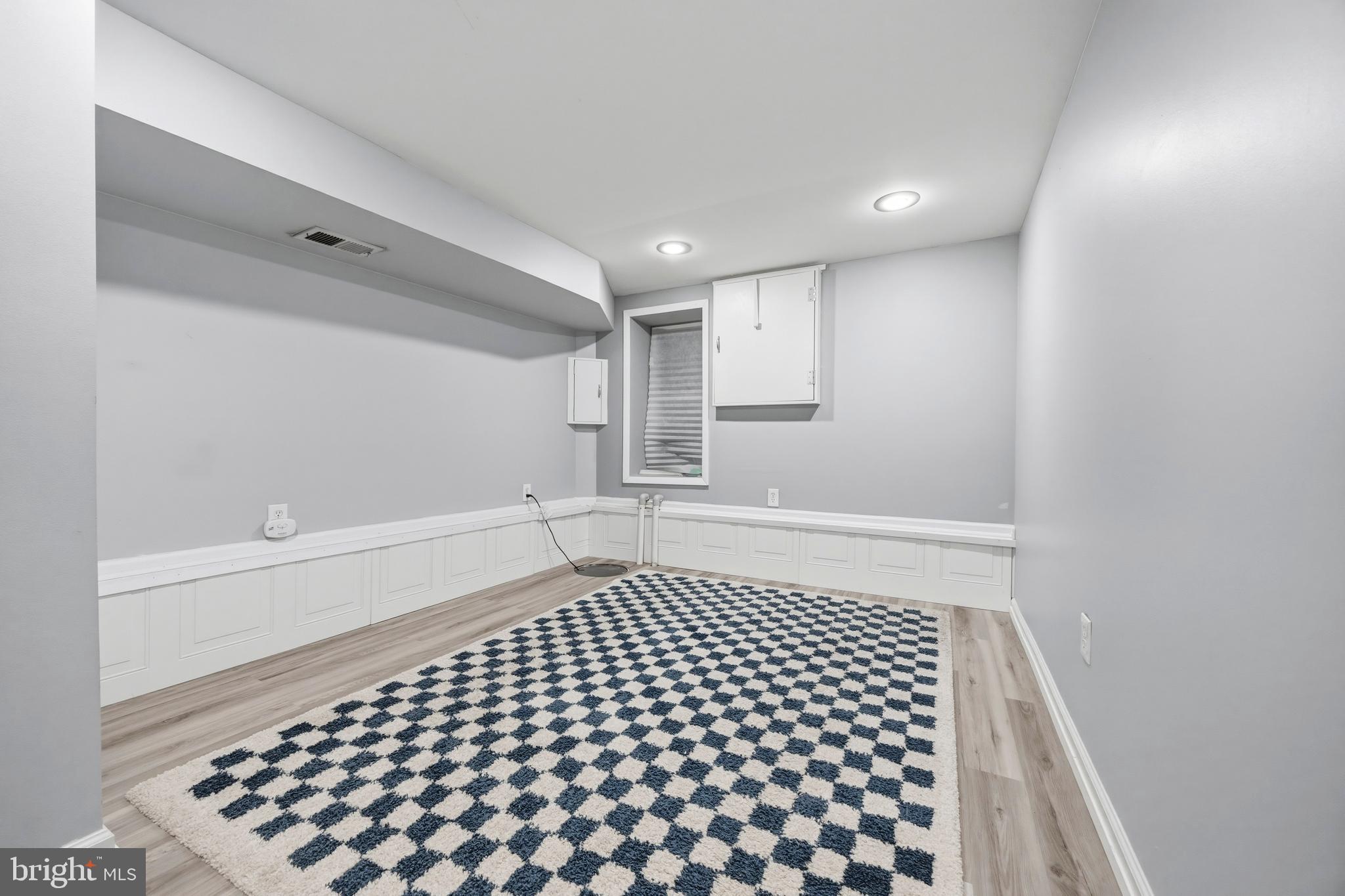 1419 Andre Street Baltimore, MD 21230 - Photo 19 of 25 a bathroom with a sink a mirror and shower