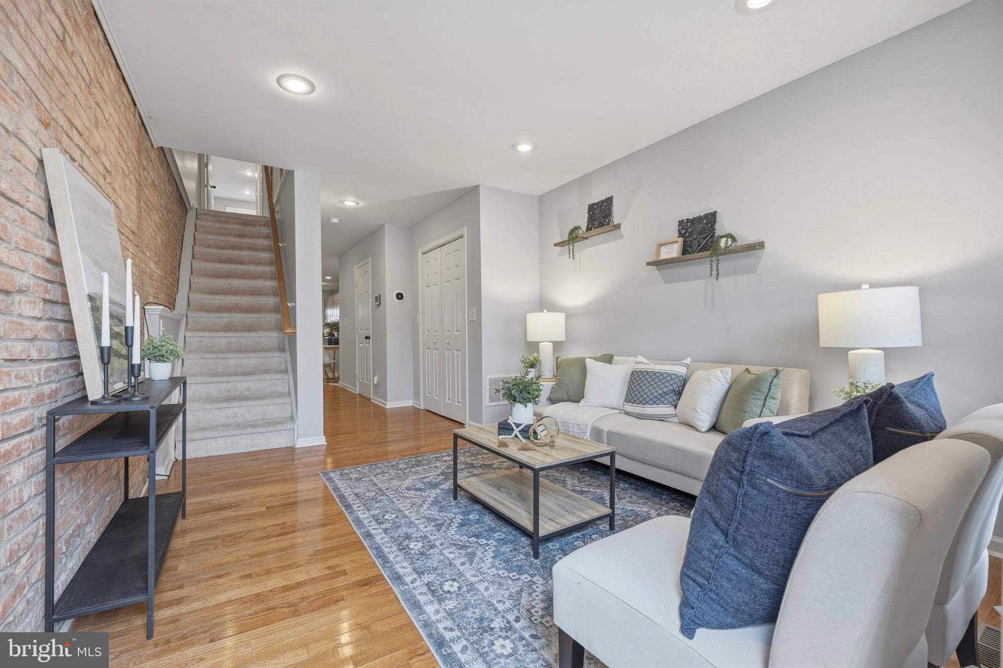 1419 Andre Street Baltimore, MD 21230 - Photo 2 of 25 a living room with furniture and a wooden floor