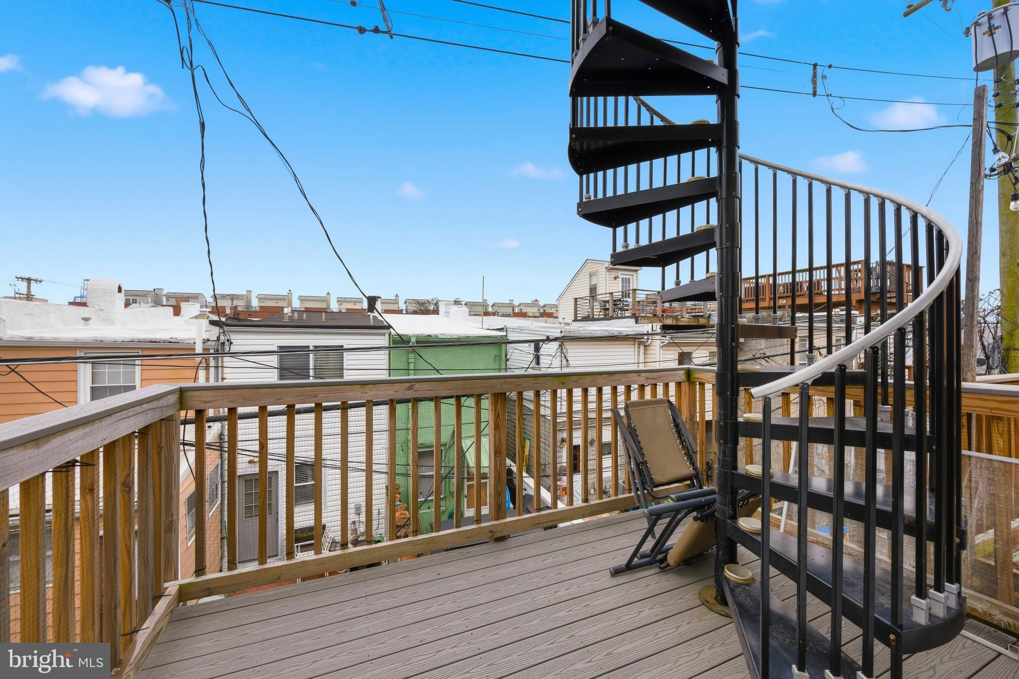 1419 Andre Street Baltimore, MD 21230 - Photo 21 of 25 a view of balcony with wooden floor