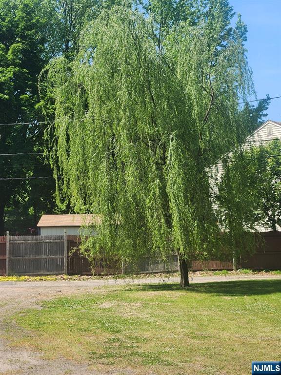 1 Cedar Lane Paramus, NJ 07652 - Photo 6 of 13 a view of a house with a yard