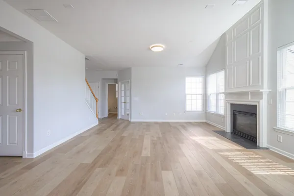 a kitchen with stainless steel appliances a refrigerator sink and microwave