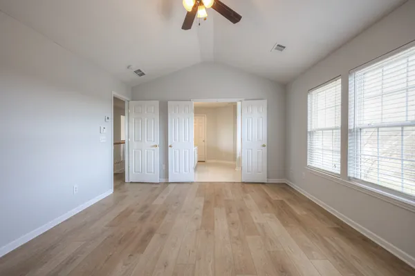 a white bath tub sitting next to a window