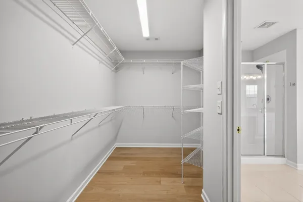 a big house with a big yard and large trees