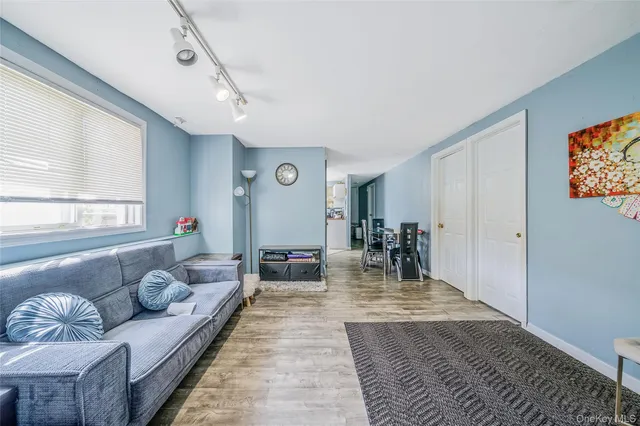 a living room with furniture and a table