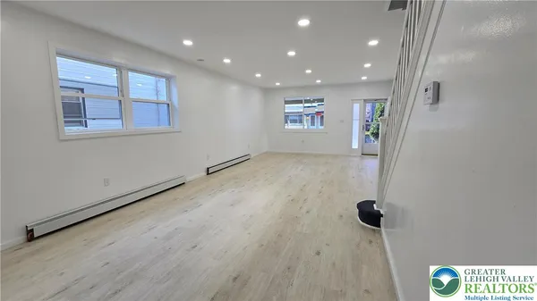 a bathroom with a sink and a shower