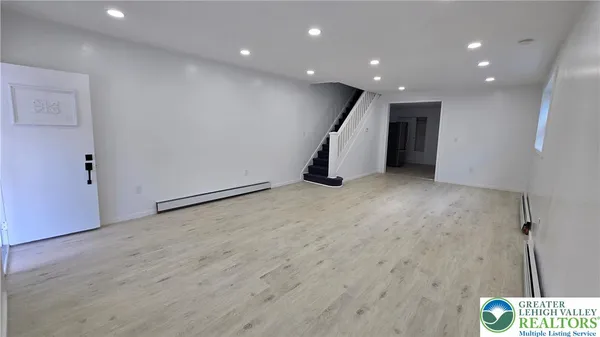 a bathroom with a sink and toilet