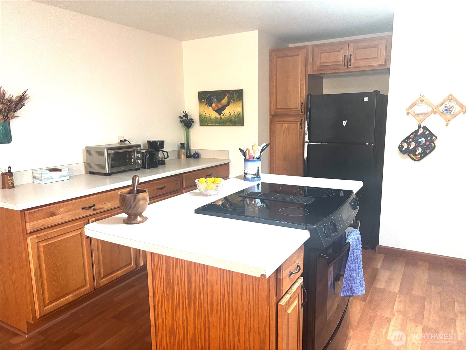 30 Marjory Lane Sequim, WA 98382 - Photo 11 of 22 a kitchen with a sink a counter top space and cabinets