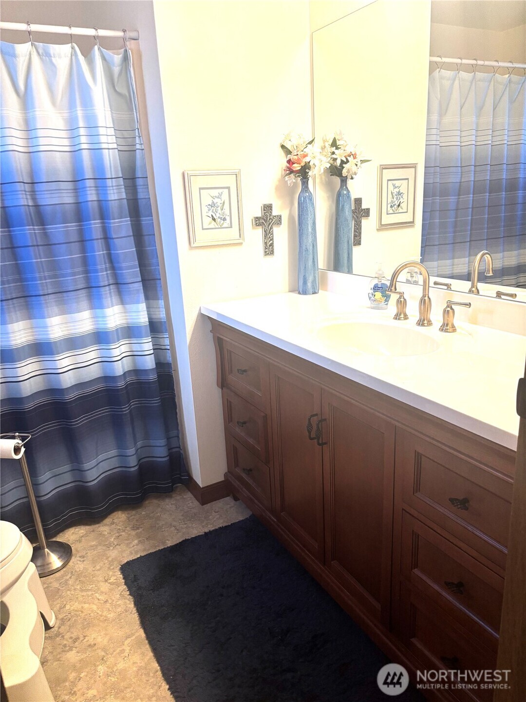 30 Marjory Lane Sequim, WA 98382 - Photo 17 of 22 a bathroom with a sink and a mirror