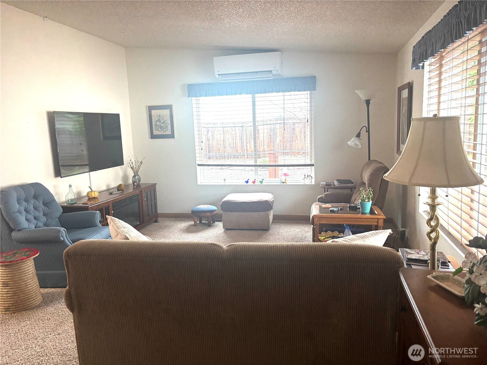 30 Marjory Lane Sequim, WA 98382 - Photo 8 of 22 a living room with furniture and a flat screen tv