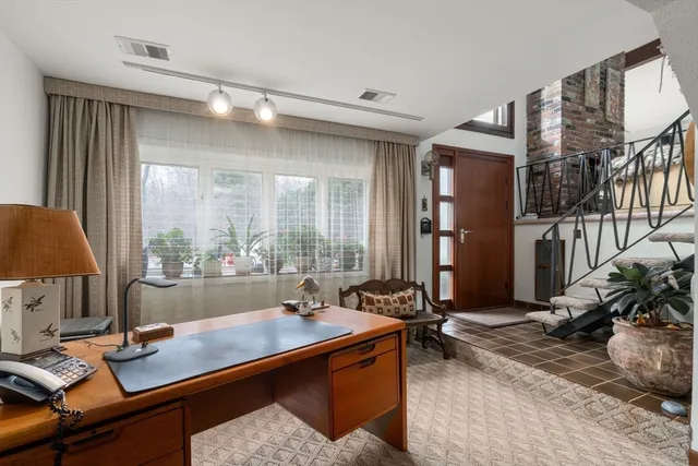 a room with furniture and a window