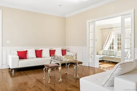 a view of hallway with wooden floor