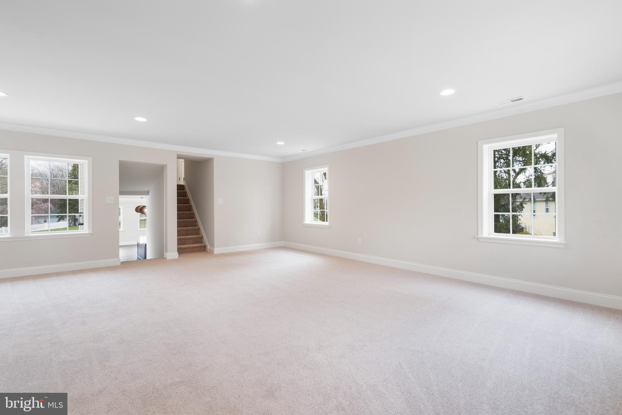 621 Beatty Road Springfield, PA 19064 - Photo 7 of 22 an empty room with windows