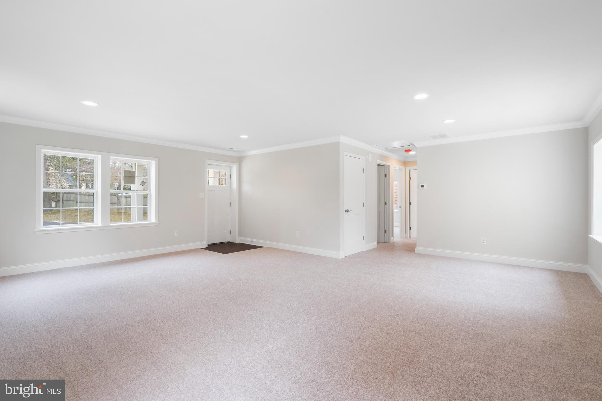 621 Beatty Road Springfield, PA 19064 - Photo 9 of 22 an empty room with windows