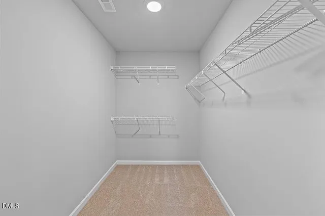 a view of a room with racks on the wall