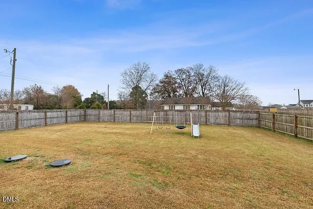 a picture of a bathroom with a shower