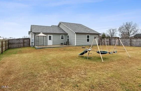 a view of a house with a swimming pool
