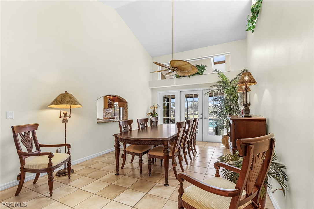 7747 Grande Pine Road Bokeelia, FL 33922 - Photo 14 of 45 a view of a dining room with furniture