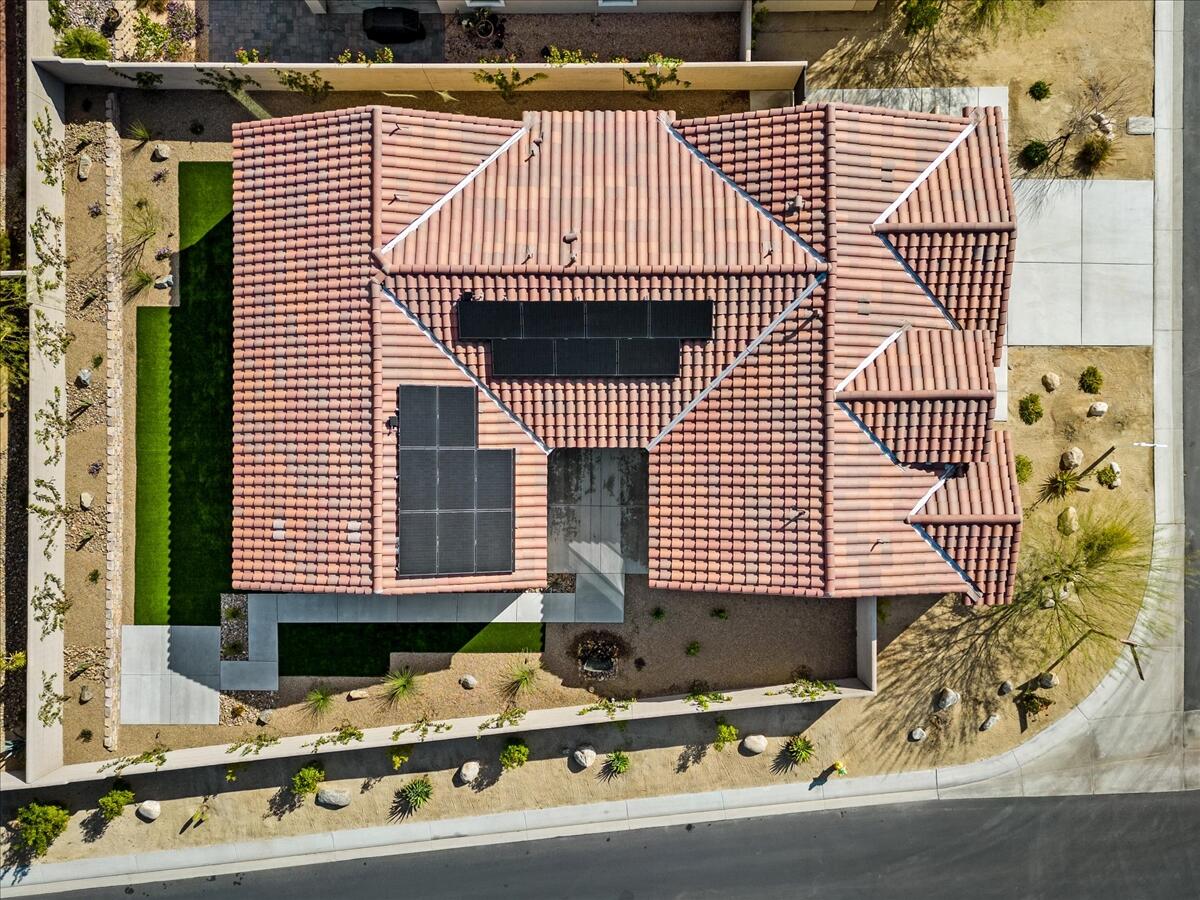 10 Gamay Rancho Mirage, CA 92270 - Photo 13 of 86 a front view of a house with a road