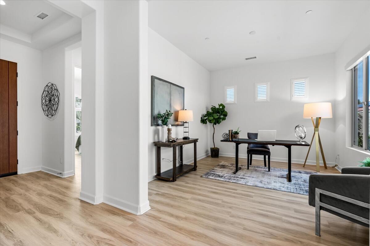 10 Gamay Rancho Mirage, CA 92270 - Photo 18 of 86 a view of a livingroom with furniture and wooden floor