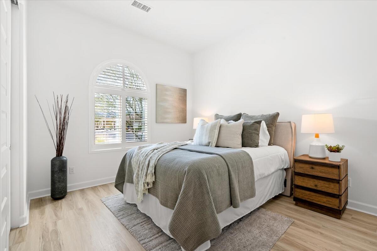10 Gamay Rancho Mirage, CA 92270 - Photo 21 of 86 a bedroom with a bed and a window