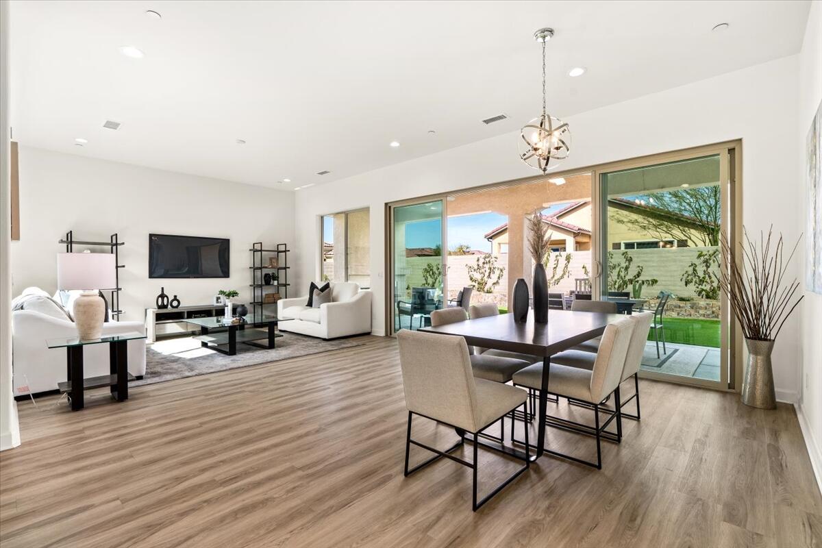 10 Gamay Rancho Mirage, CA 92270 - Photo 25 of 86 a view of a dining room with furniture window and wooden floor